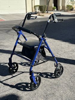 Walker with seat by Drive (only until Sunday the 20th)