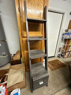 Gray shelf unit