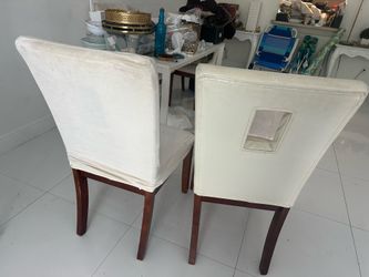 4 ivory leather chairs / wooden legs