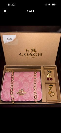 Coach with charms