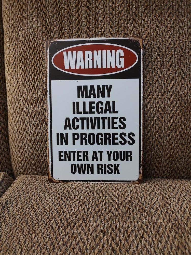 WARNING METAL SIGN.  12" X 8".  NEW.  PICKUP ONLY.