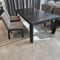 Black wood dining room table with 4 chairs