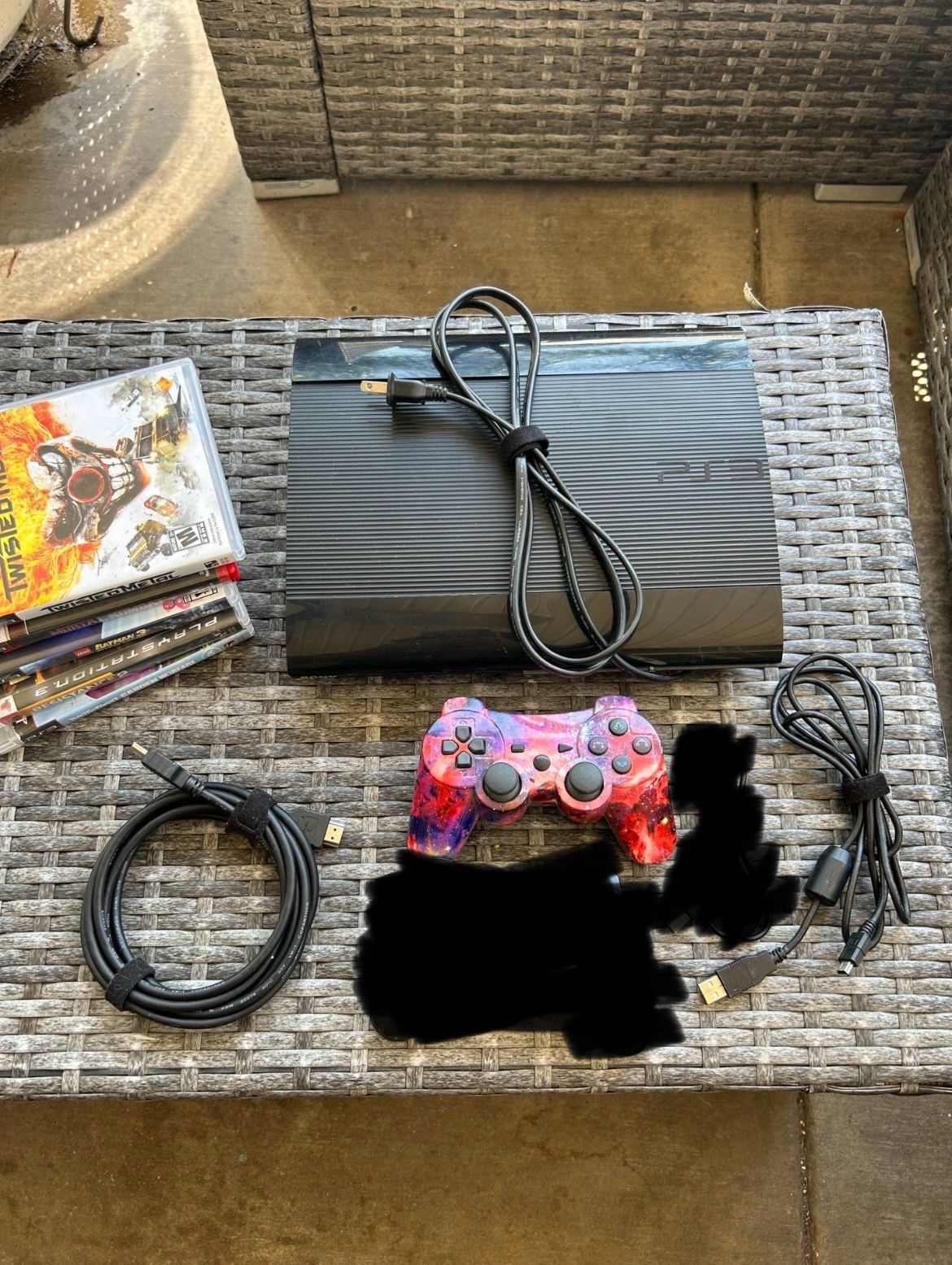 PS3 Super Slim Console 2 Controllers And Games