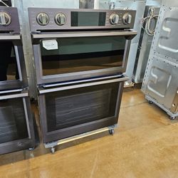 Black Stainless Steel Sa msung 30 Inch Wide Combination Wall Ov en And Mic rowave