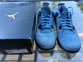 Air Jordan 4 Retro “University Blue” (Grade School) in size 2.5Y.