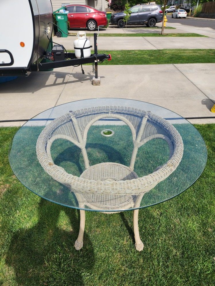 Glass and wicker table.