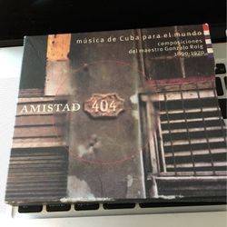 See Photos. Amistad 404 Audio Cd