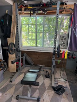 Squat rack/bench press with bench and bar