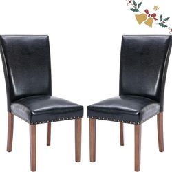 Pair of PULeather Parsons dining chairs