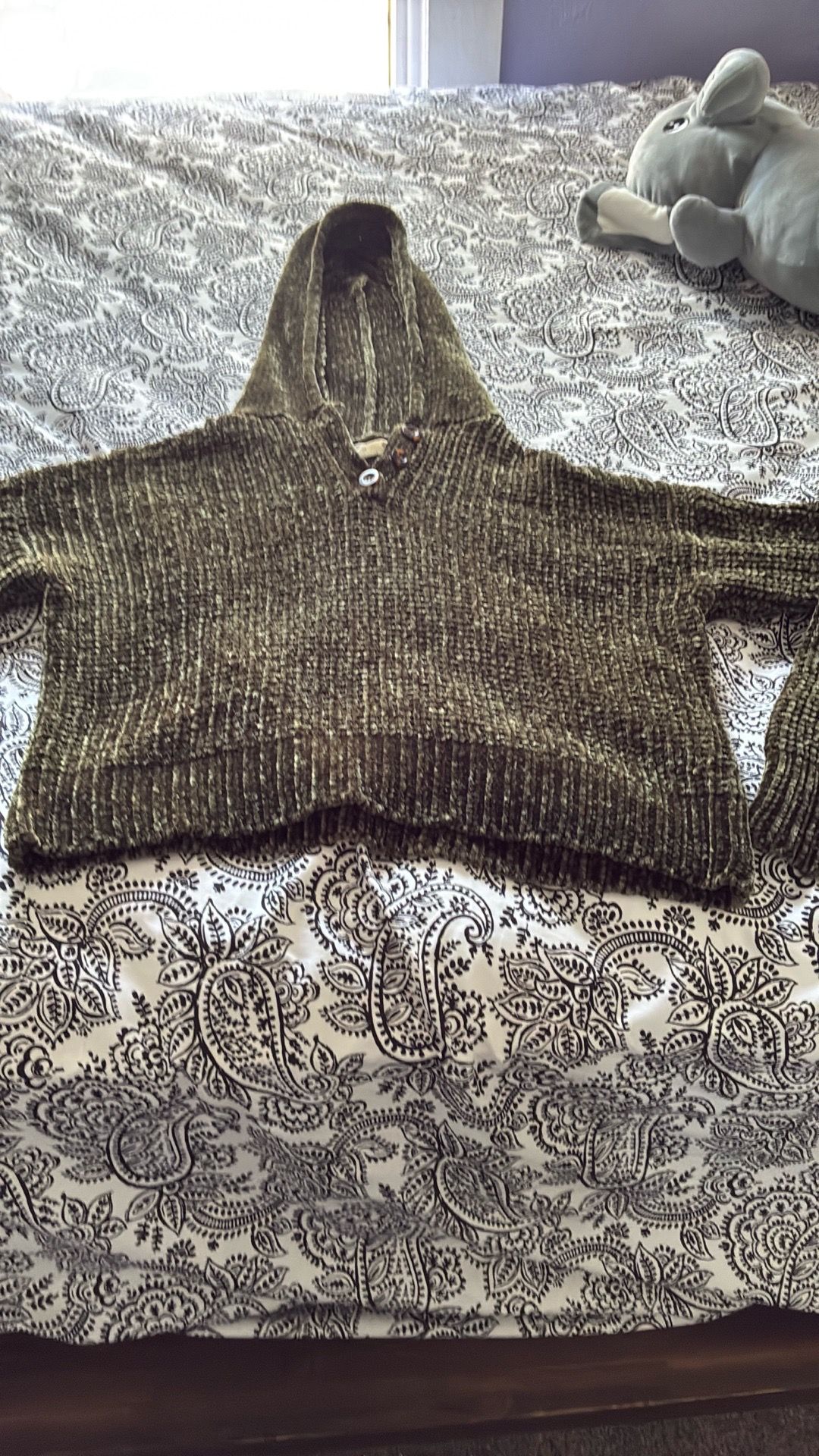 Green knitted sweater