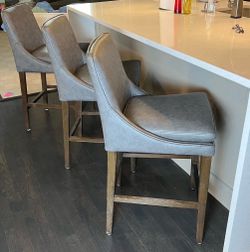 3 Arhaus “Lunden” counter-height swivel stools