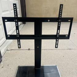 Tv stand with glass bottom