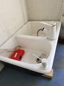 Dual deep heavy cast-iron sink with Moen faucet