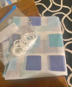 Shower curtain with hooks