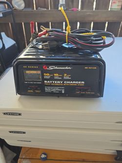 Battery charger used cash only local pick up