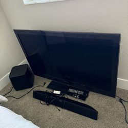 Samsung TV with Polkaudio Sound Bar and Sub