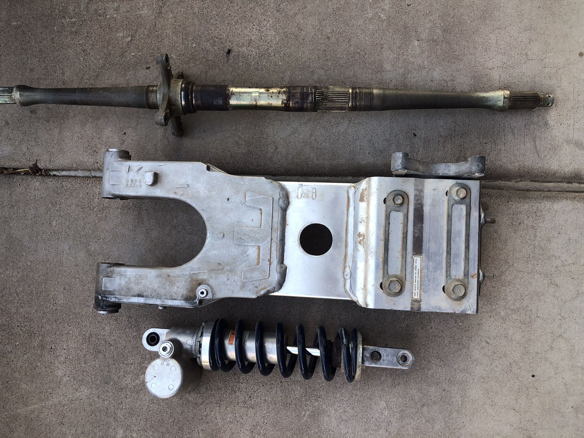 2003 Suzuki Ltz 400 stock rear swingarm, shock and axle.