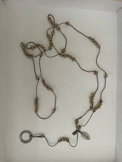 Long Beaded Cord Necklace with Leaf Charm / Paula Colletto