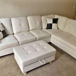 White Leather Sectional Couch And Ottoman