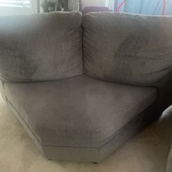 Gray corner sofa piece