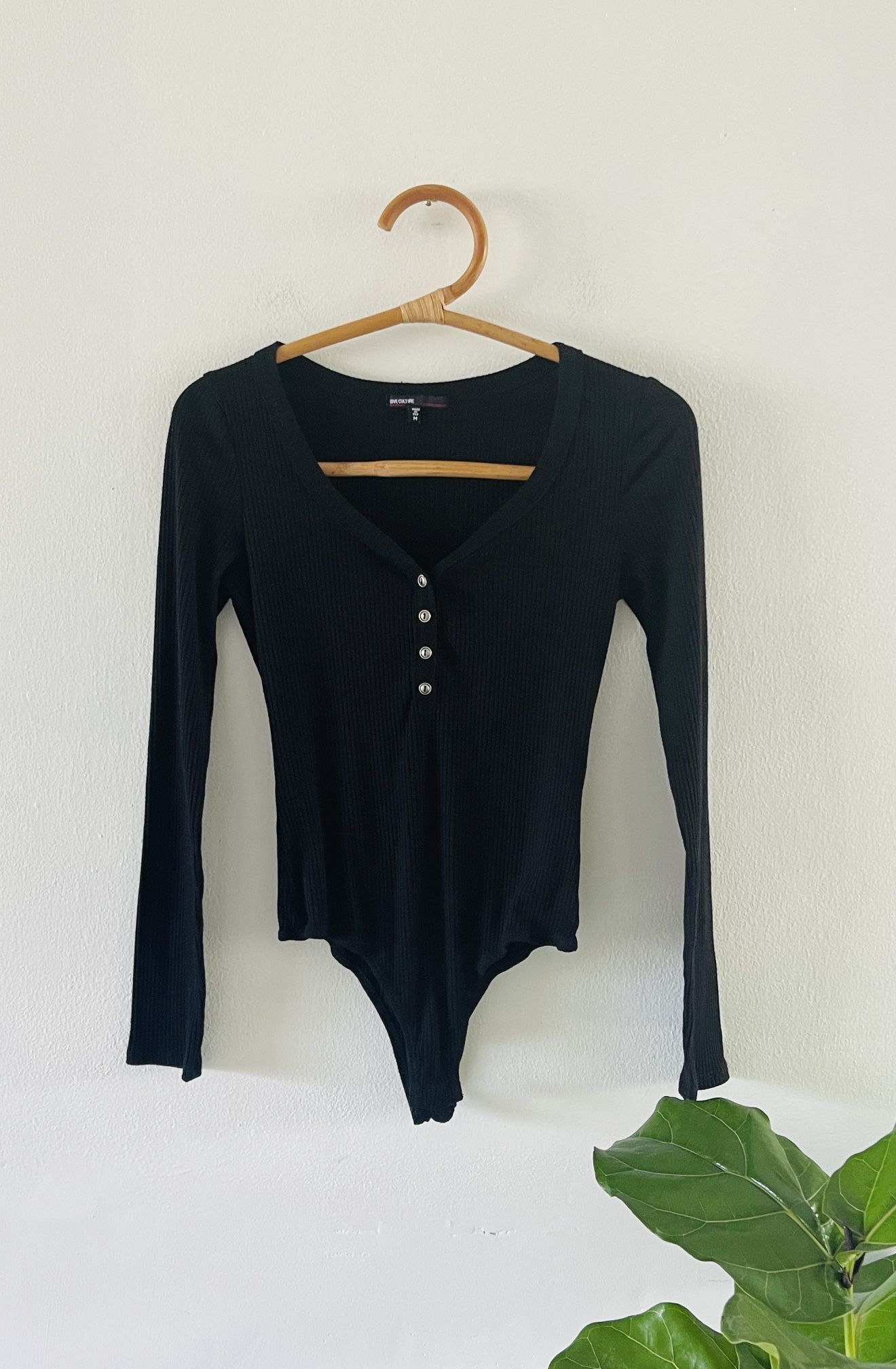 Love culture black bodysuit. Bin Q