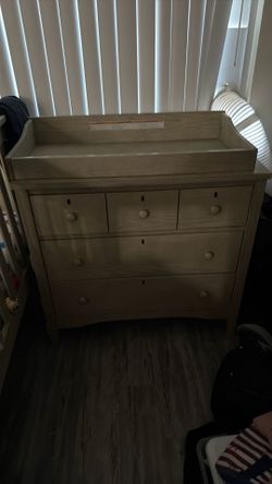 Dresser with removal changing table