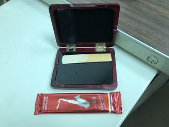 Saxophone reed case.