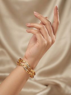 Gold Wave Bangle Bracelets with Red and White Stones