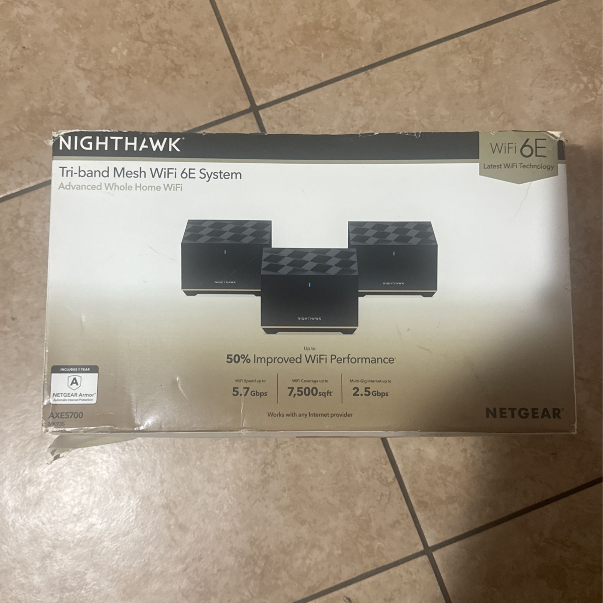 NETGEAR Nighthawk Tri-Band Whole Home Mesh WiFi 6E System (MK93S) – Router + 2 Satellite Extenders - 5.7Gbps Speed - Coverage up to 7,500 sq. ft., 100