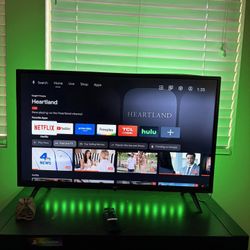 30 Inch Tv TCL With LED Lights On The Back 