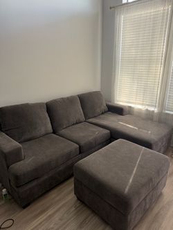 Living Spaces Grey Sectional Sofa with Ottoman