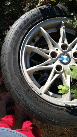 Four OEM BMW Rims with tires