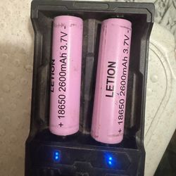 2 Letion 18(contact info removed)mah 3.7 volt rechargable batteries and charger