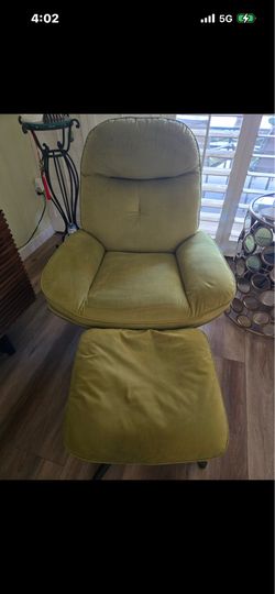 Green fabric recliner chair