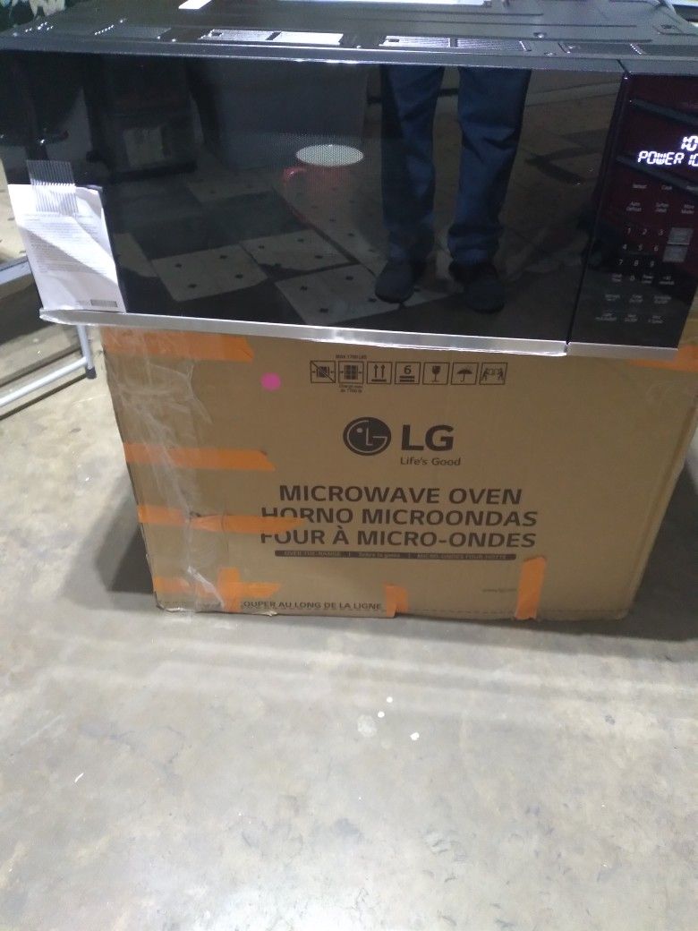 LG 1.3 cu. ft. 30 in. W Low Profile Over the Range Microwave Oven