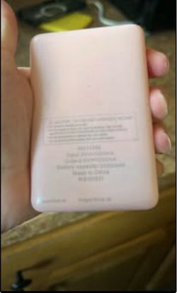 Pink Power bank comes with 4ft red charger