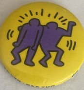 Very Rare Keith Haring Purple Dancers On Yellow Ground Button Pin w/ Artist's Trademark On Edge Curl
