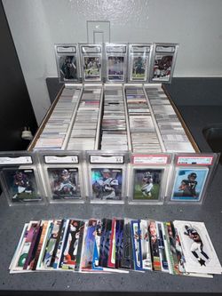 Football card collection includes everything in photos 1980s-current