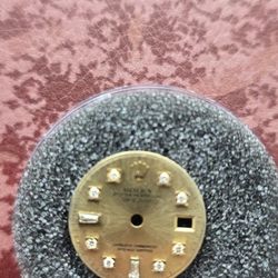 26mm Rolex dial with gold elements and dimonds and crystals.