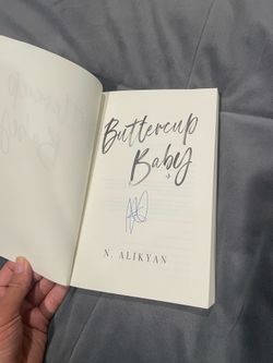 Signed Paperback Book