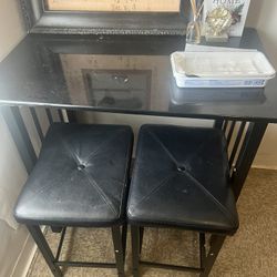 Black Table and Chairs