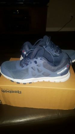 Blue and grey Size 8 reebok running shoe.
