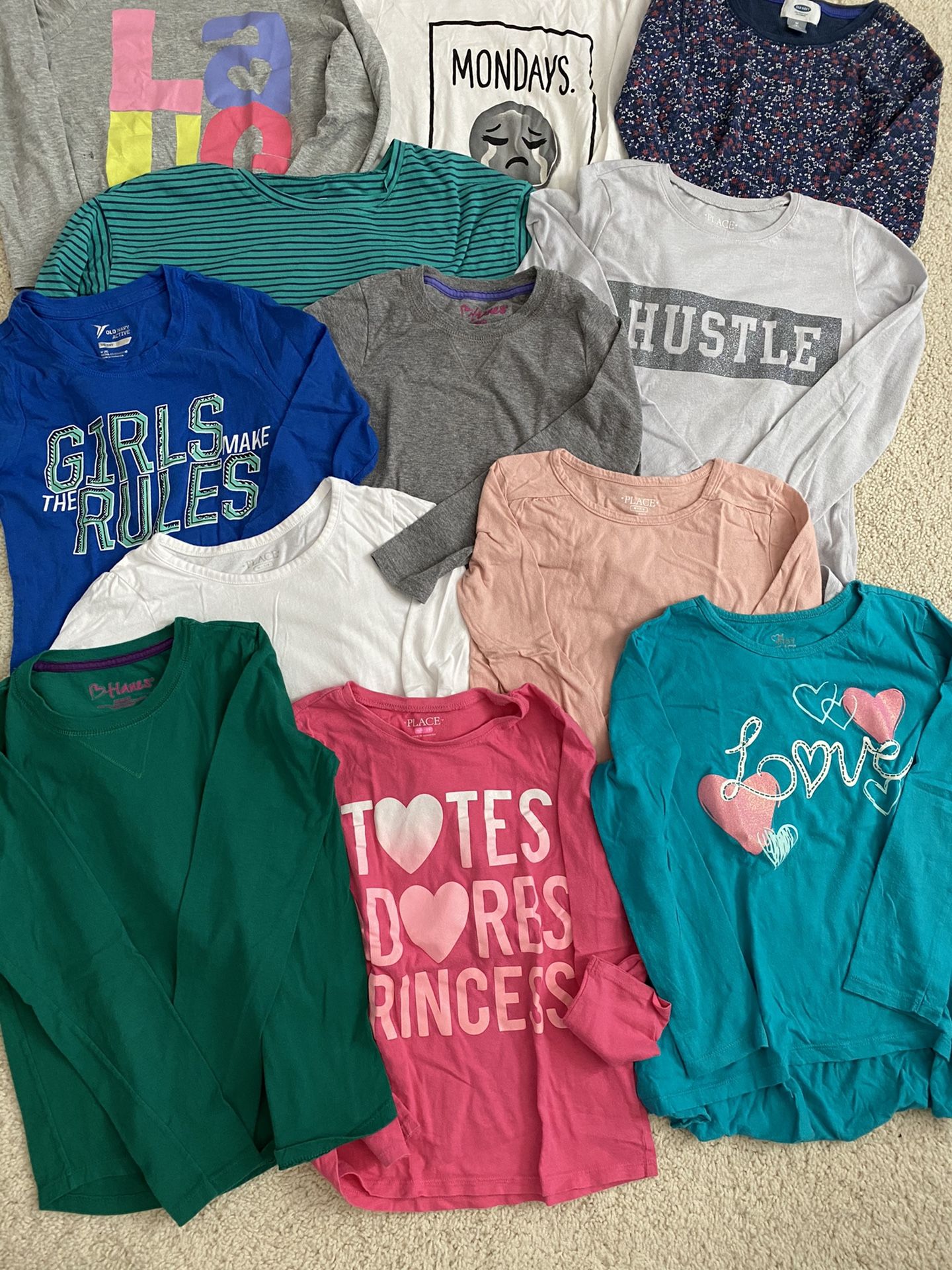 Girls long sleeve shirts, sizes 7-8, $1 each