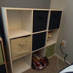 Two Storage Cubbies With Cloth Baskets