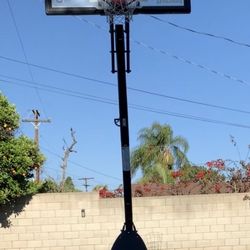 Spalding 54" Portable Basketball System Adjustable Hoop Backboard Angled Pole