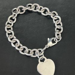 Tiffany & Co. Sterling Silver Heart Tag Charm Bracelet — 7.5”, 34.90 grams, Unengraved