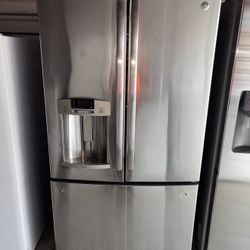 GE Stainless Steel Refrigerator And Freezer