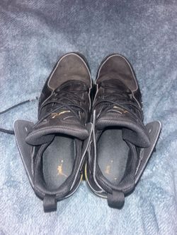 Air Jordan Black and Gold Sneakers