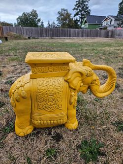 Yellow elephant plant stand/table