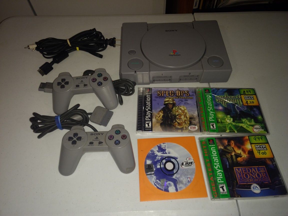 Firm price. PlayStation 1 with games